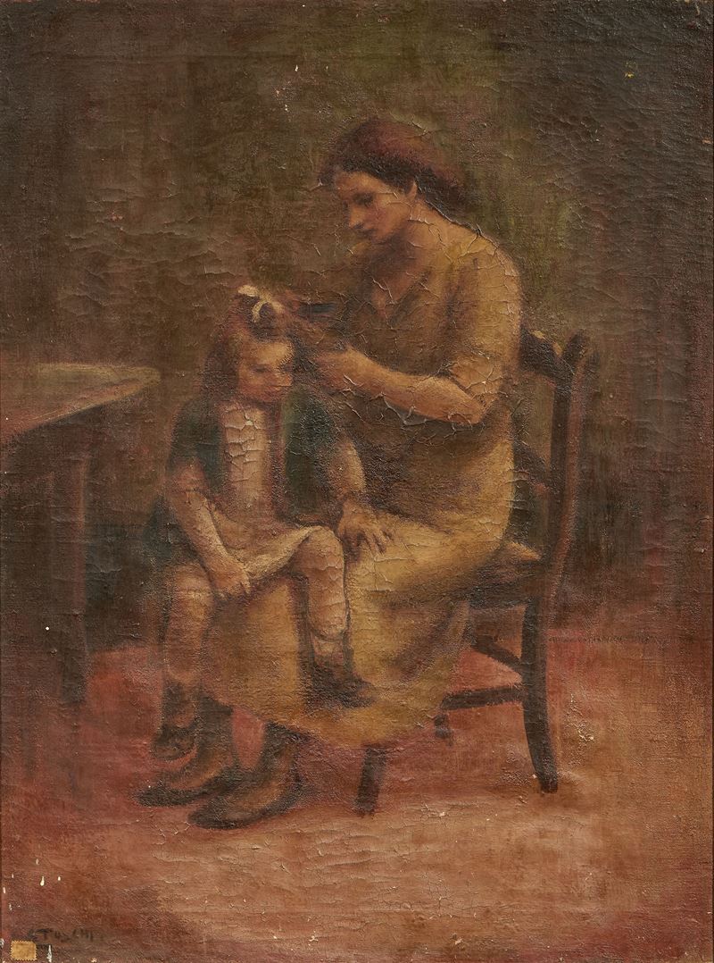Mamma che pettina la bambina