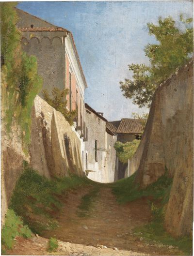 Effetto di Luce in una Strada di Paese in Salita