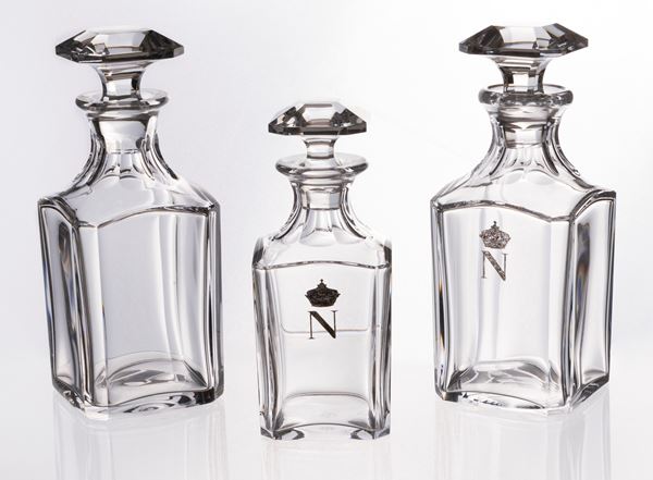 Tre bottiglie da whisky in cristallo incolore Baccarat