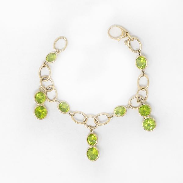Bracciale in oro giallo e peridoti  - Auction Jewels and Watches - Casa d'aste Farsettiarte