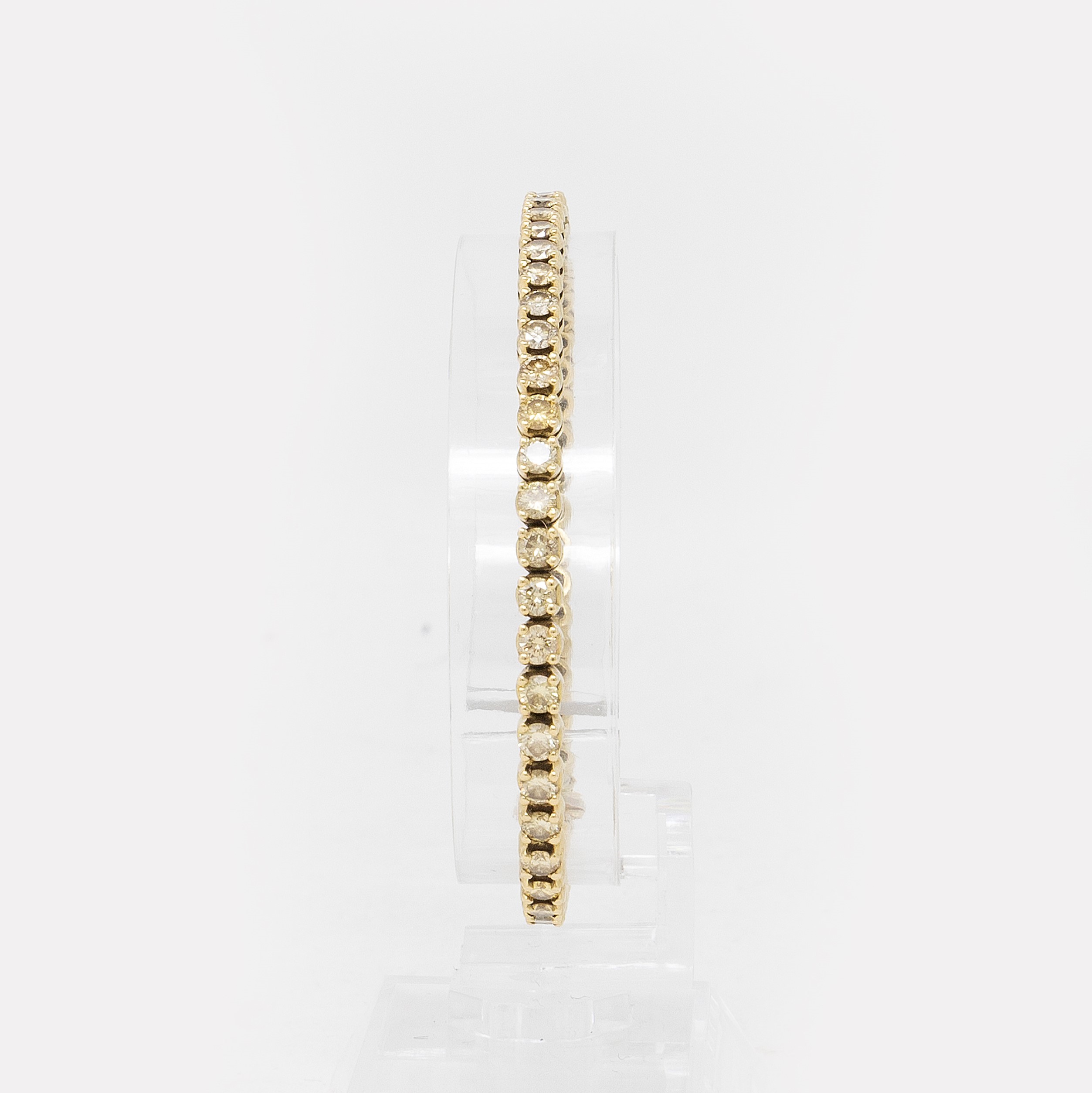 Carati, Bracciale Tennis in Oro Giallo con Diamanti