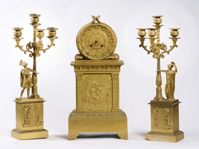Trittico in Bronzo Dorato Composto da un Orologio e Due Candelieri