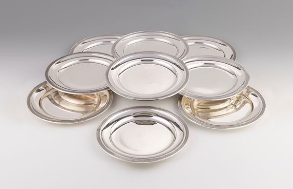 Nove piatti in argento