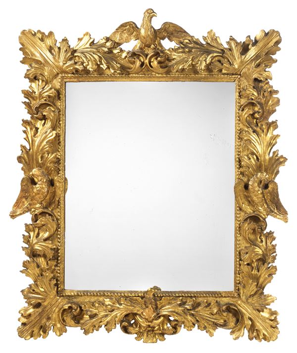 Specchiera in legno intagliato e dorato  - Asta Importanti Arredi, Maioliche, Sculture e Dipinti Antichi - Casa d'aste Farsettiarte