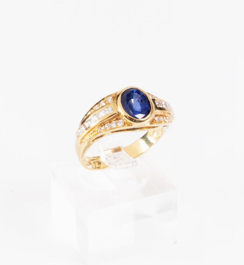 Anello a Fascia Bombata in Oro Giallo con Zaffiro e Diamanti