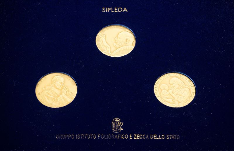 Tre Medaglie in Oro Giallo