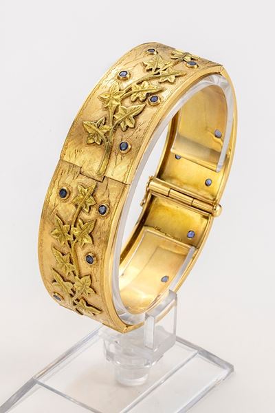 Bracciale Semirigido a Fascia in Oro Rosso e Giallo