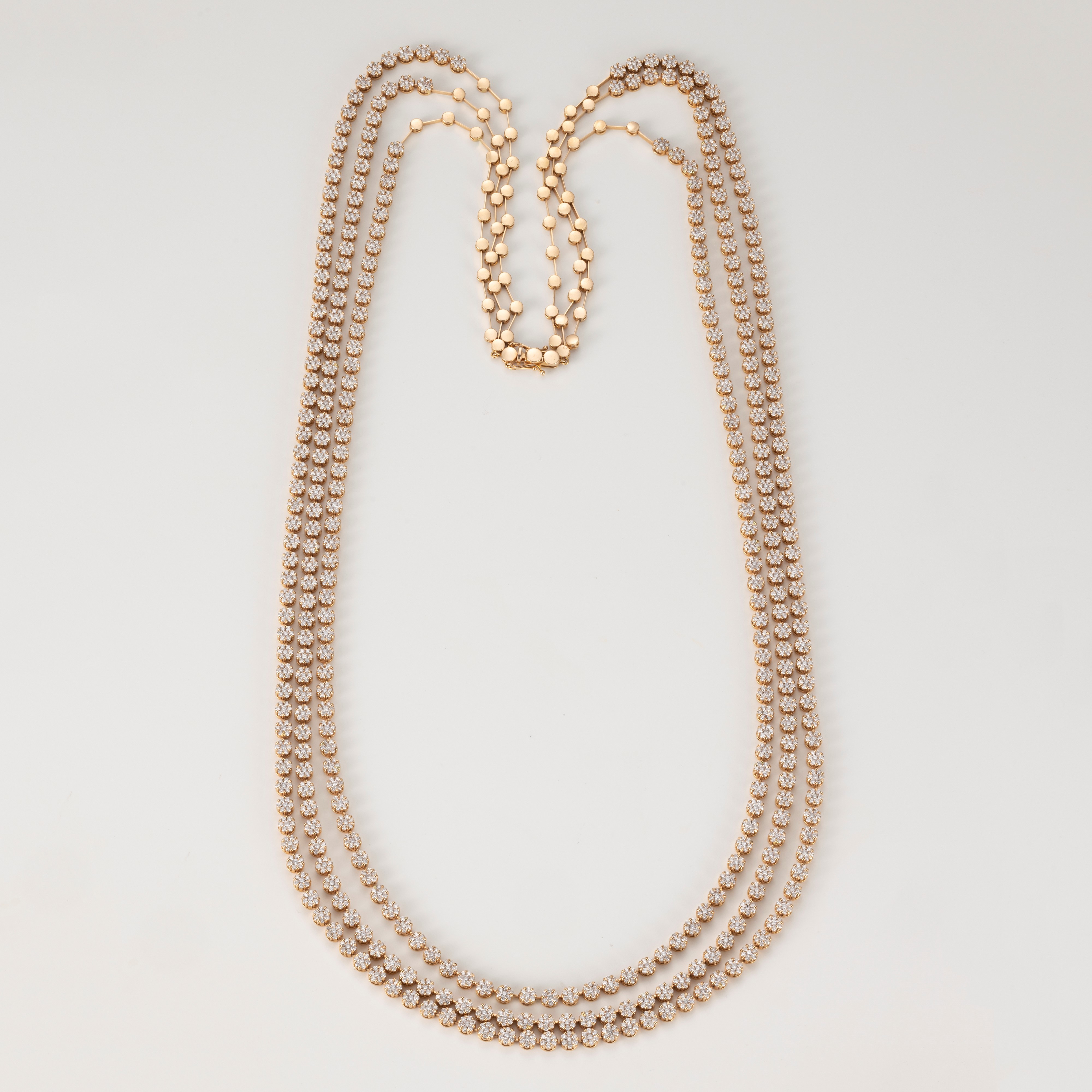 Importante collana in oro rosa e diamanti