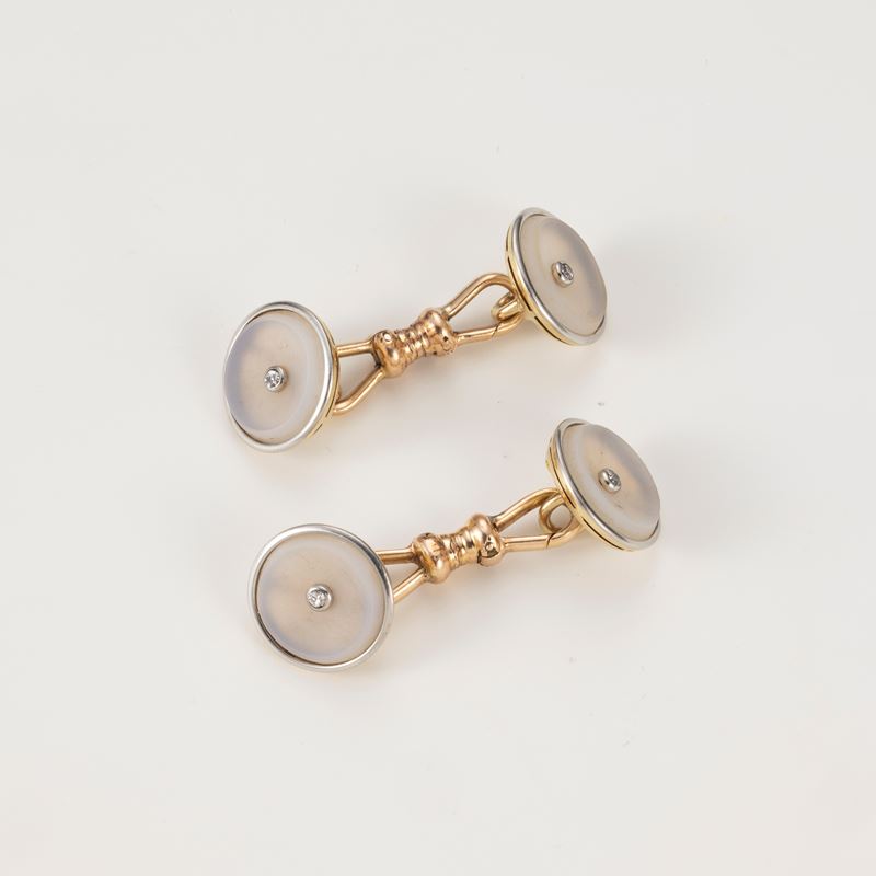 Gemelli in oro con cristallo di rocca satinato e piccoli diamanti