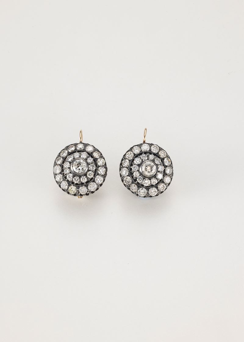 Orecchini in oro giallo e argento con diamanti