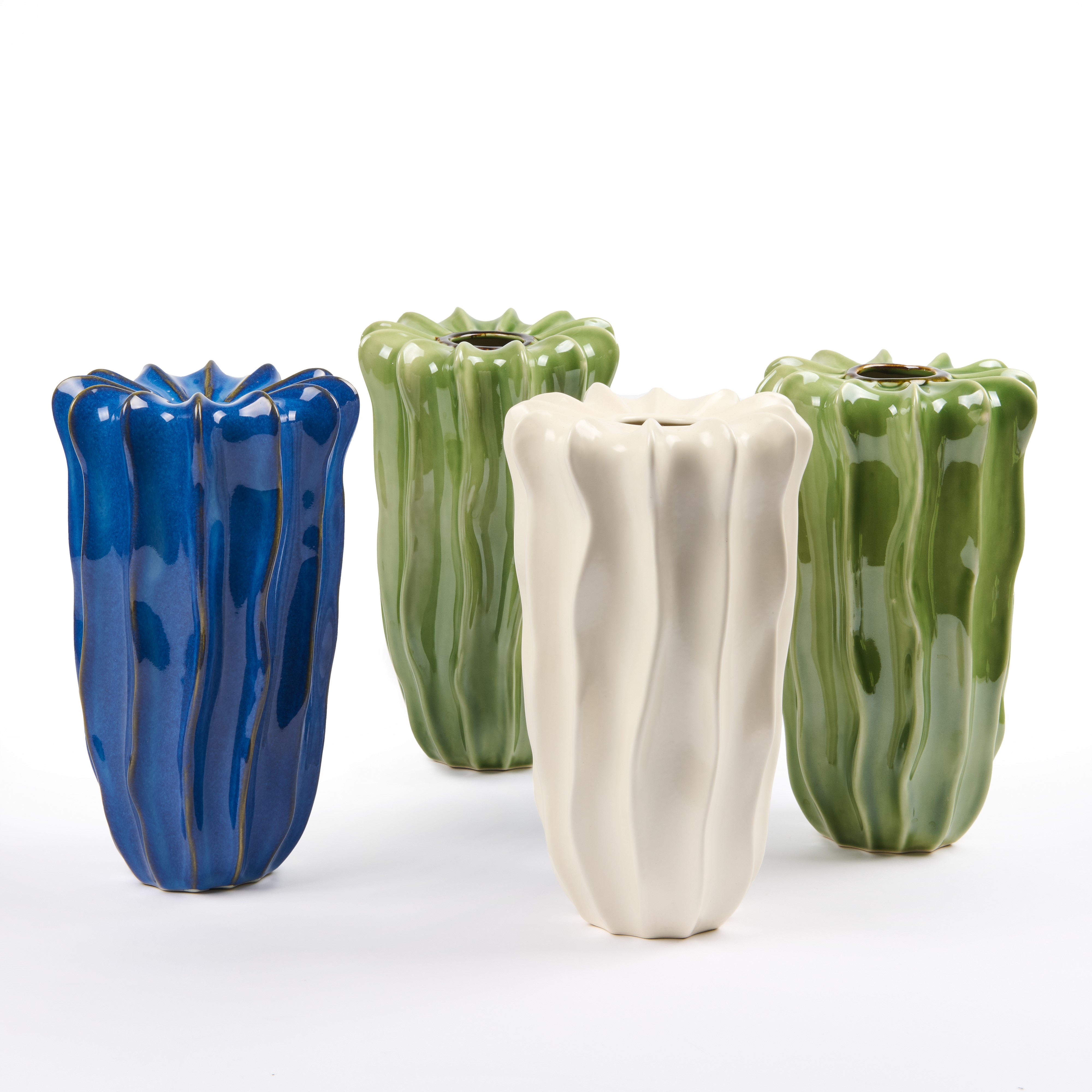 Quattro vasi in ceramica costolata colorata