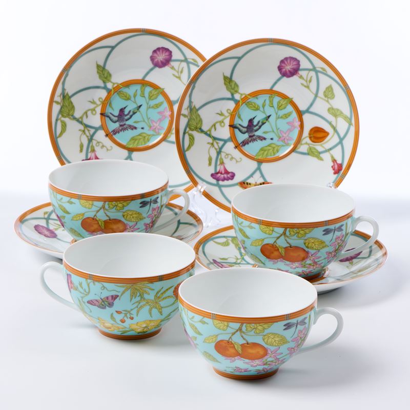 Hèrmes "Siesta Island" quattro tazze da tè e un piattino in porcellana