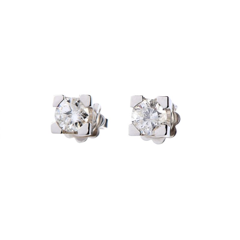 Orecchini punto luce in oro bianco e diamanti