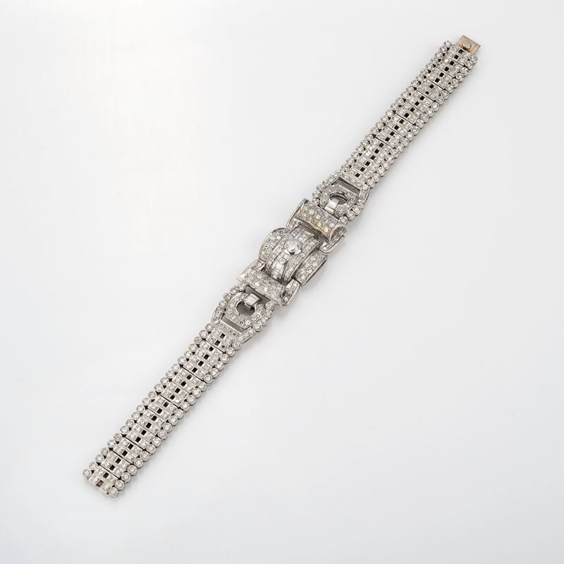 Bracciale a fascia larga snodata in platino e diamanti