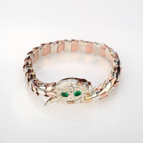Bracciale a serpente in oro con diamanti e smeraldi 