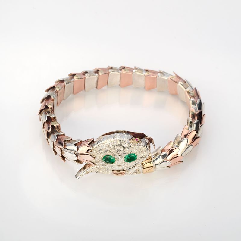 Bracciale a serpente in oro con diamanti e smeraldi