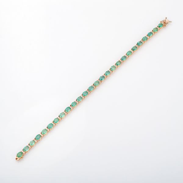 Bracciale in oro giallo con diamanti e smeraldi