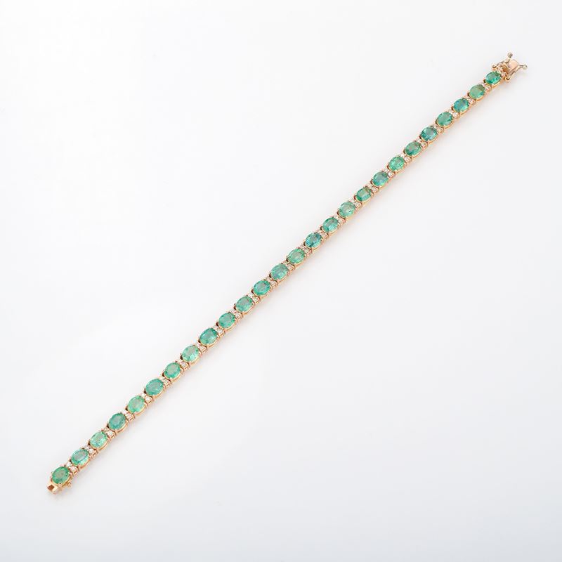 Bracciale in oro giallo con diamanti e smeraldi