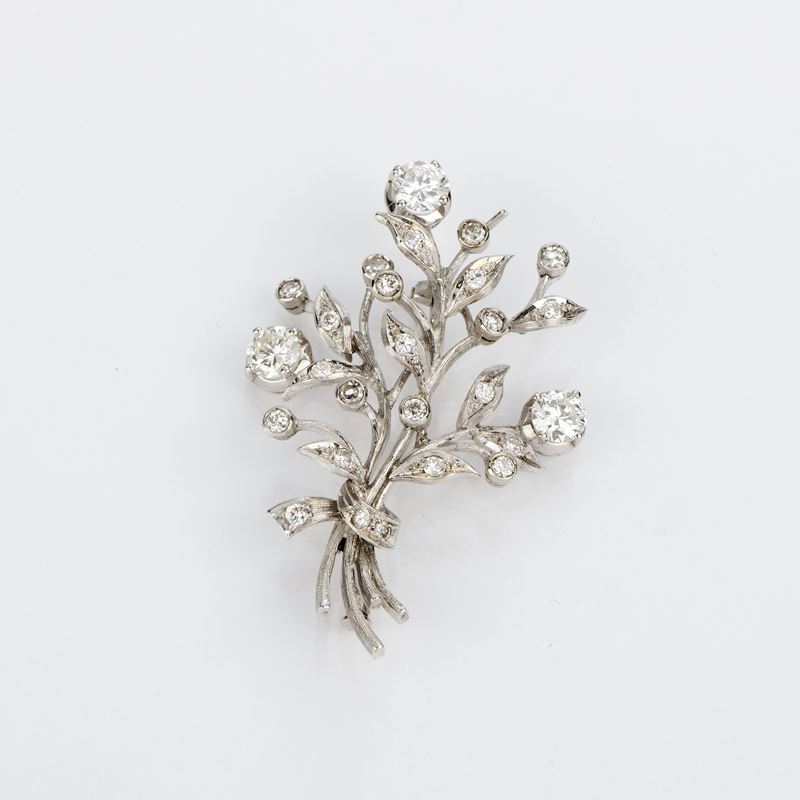Spilla tralcio fiori in oro bianco e diamanti