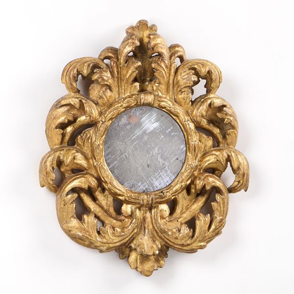 Specchiera in legno intagliato e dorato a cartoccio  - Asta Mobili, Sculture, Disegni e Dipinti Antichi - Casa d'aste Farsettiarte