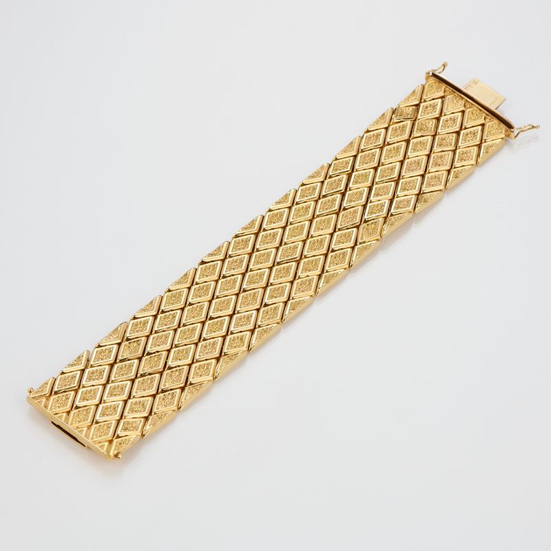 Bracciale a fascia snodata in oro giallo, 1950 ca.