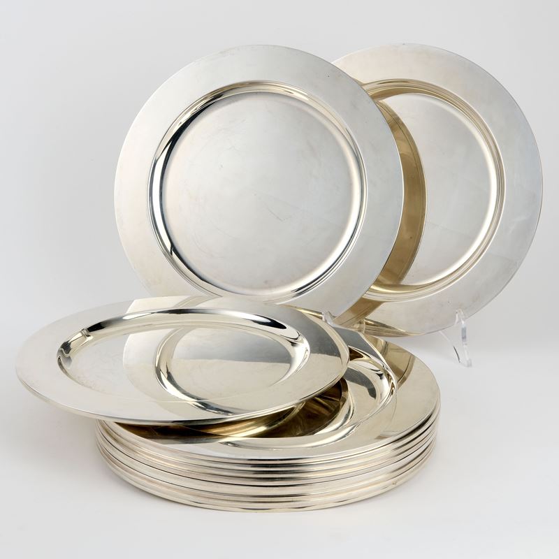 Dodici sottopiatti in argento