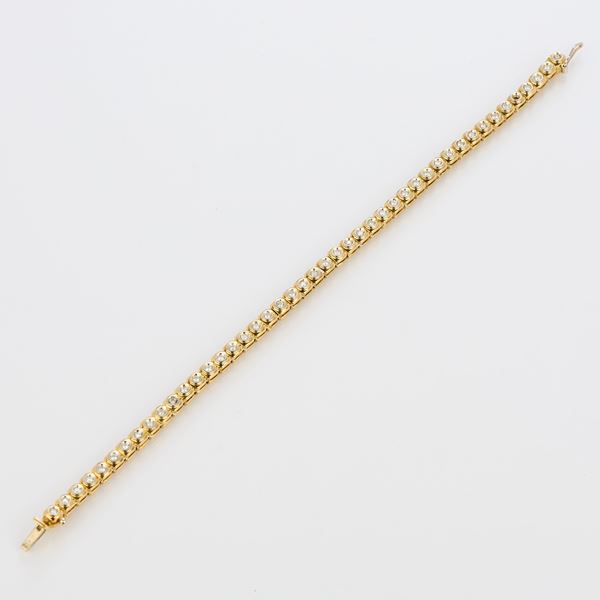 Bracciale tennis in oro giallo e diamanti