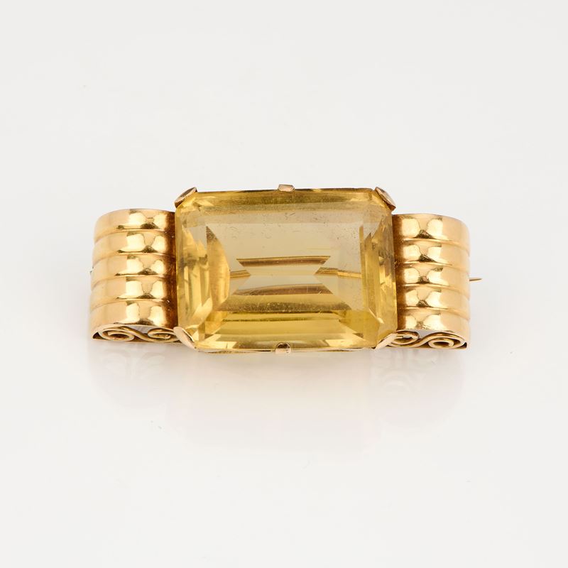 Spilla geometrica in oro giallo e quarzo citrino