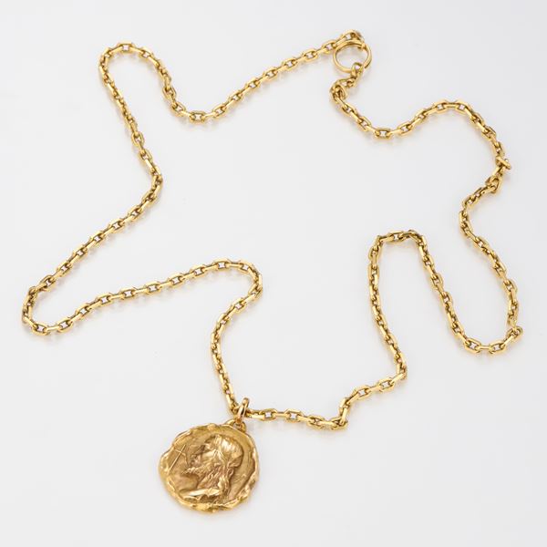 Catenina in oro giallo con medaglia