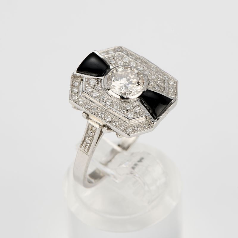 Anello ottagonale in platino con onice e diamanti