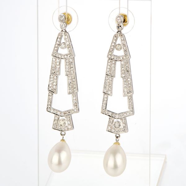 Orecchini in oro bianco con diamanti e perle