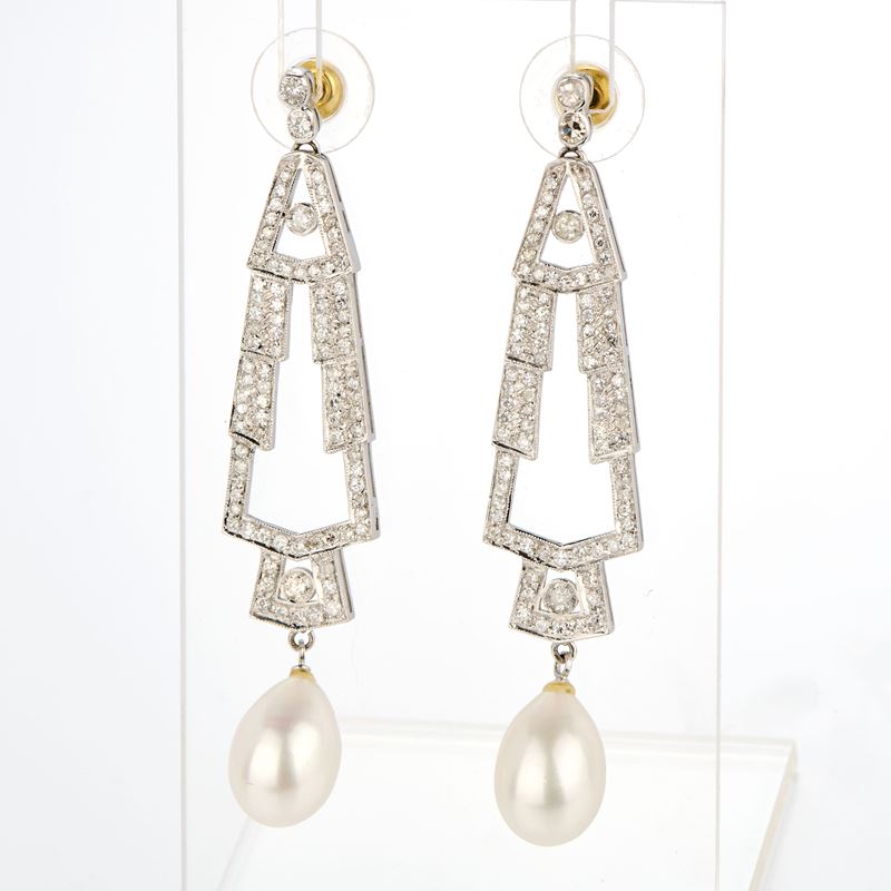 Orecchini in oro bianco con diamanti e perle