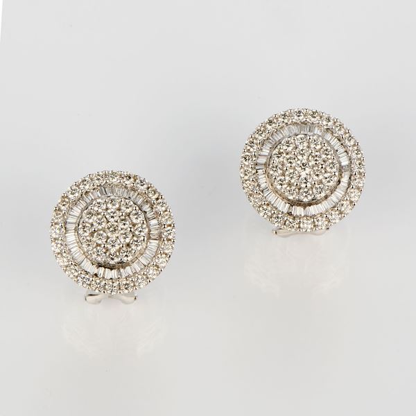 Orecchini circolari a clips in oro bianco e diamanti