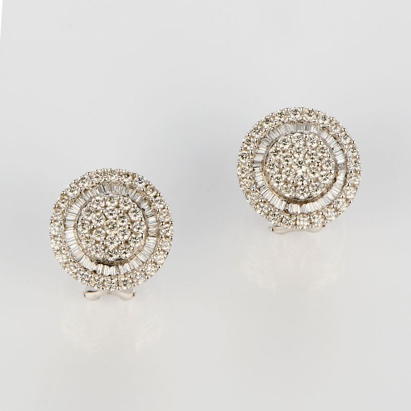 Orecchini circolari a clips in oro bianco e diamanti