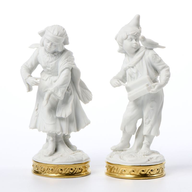 Contadinella che danza e suonatore di organetto