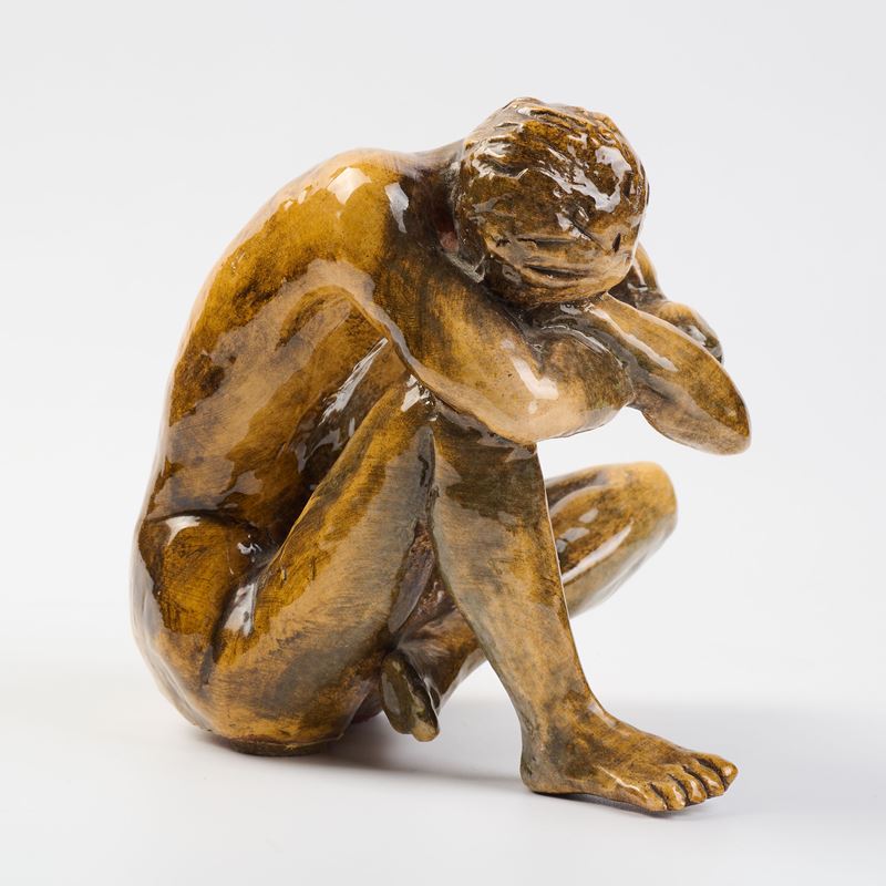 Nudo accovacciato