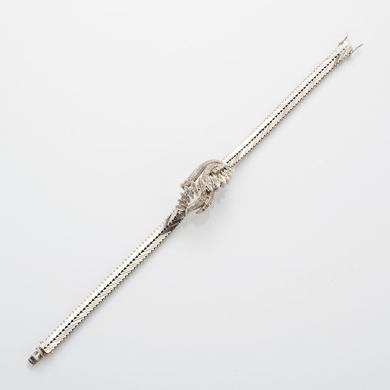 Bracciale a maglia semirigida in oro bianco con diamanti