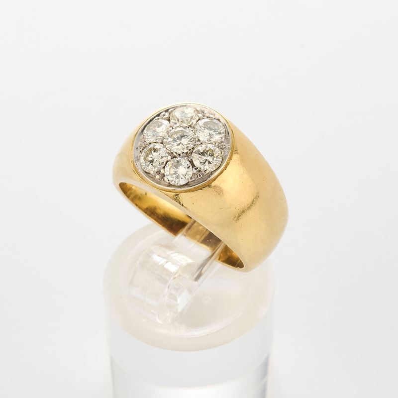 Anello a fascia in oro giallo con diamanti