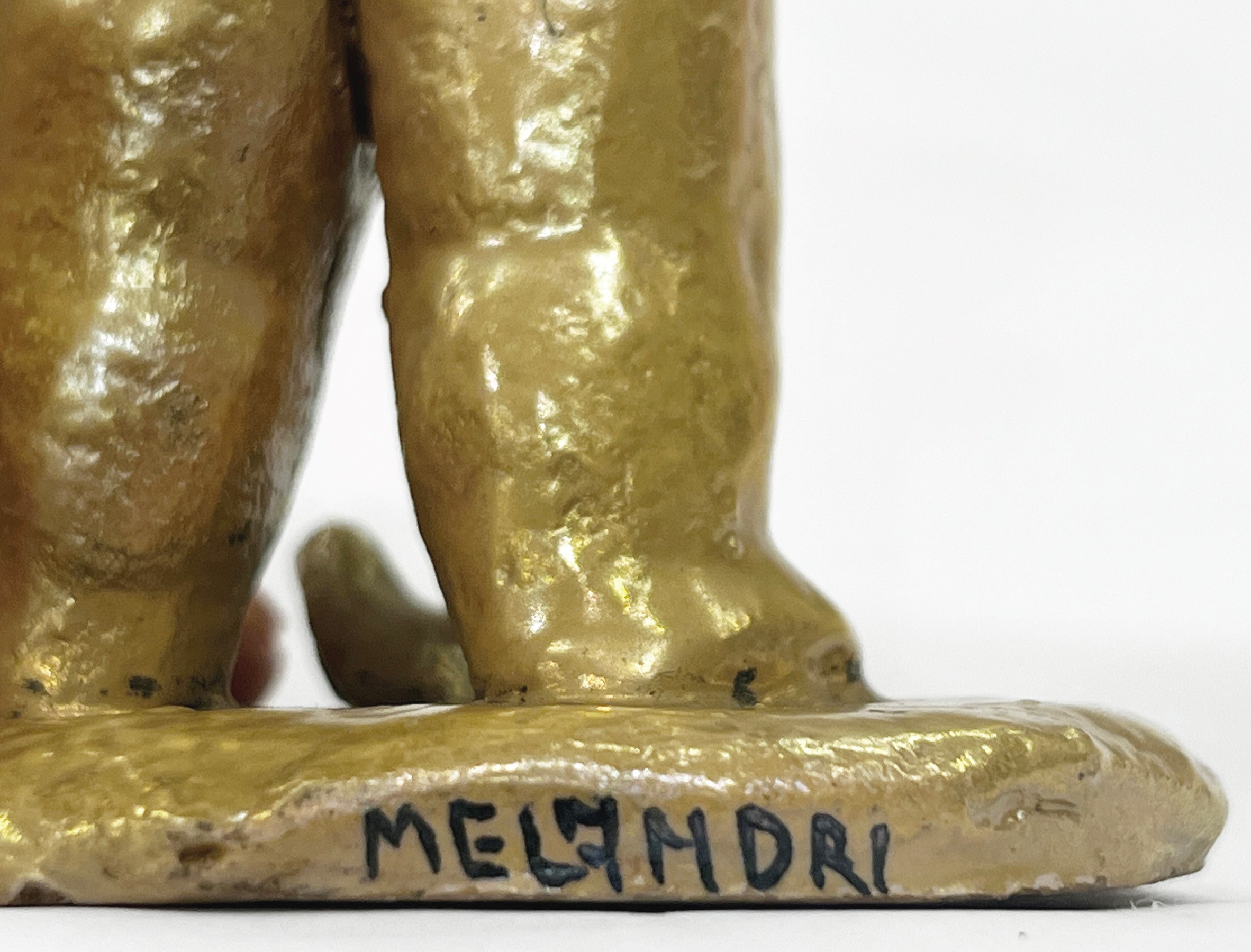 Bacco che mostra un tralcio di vite