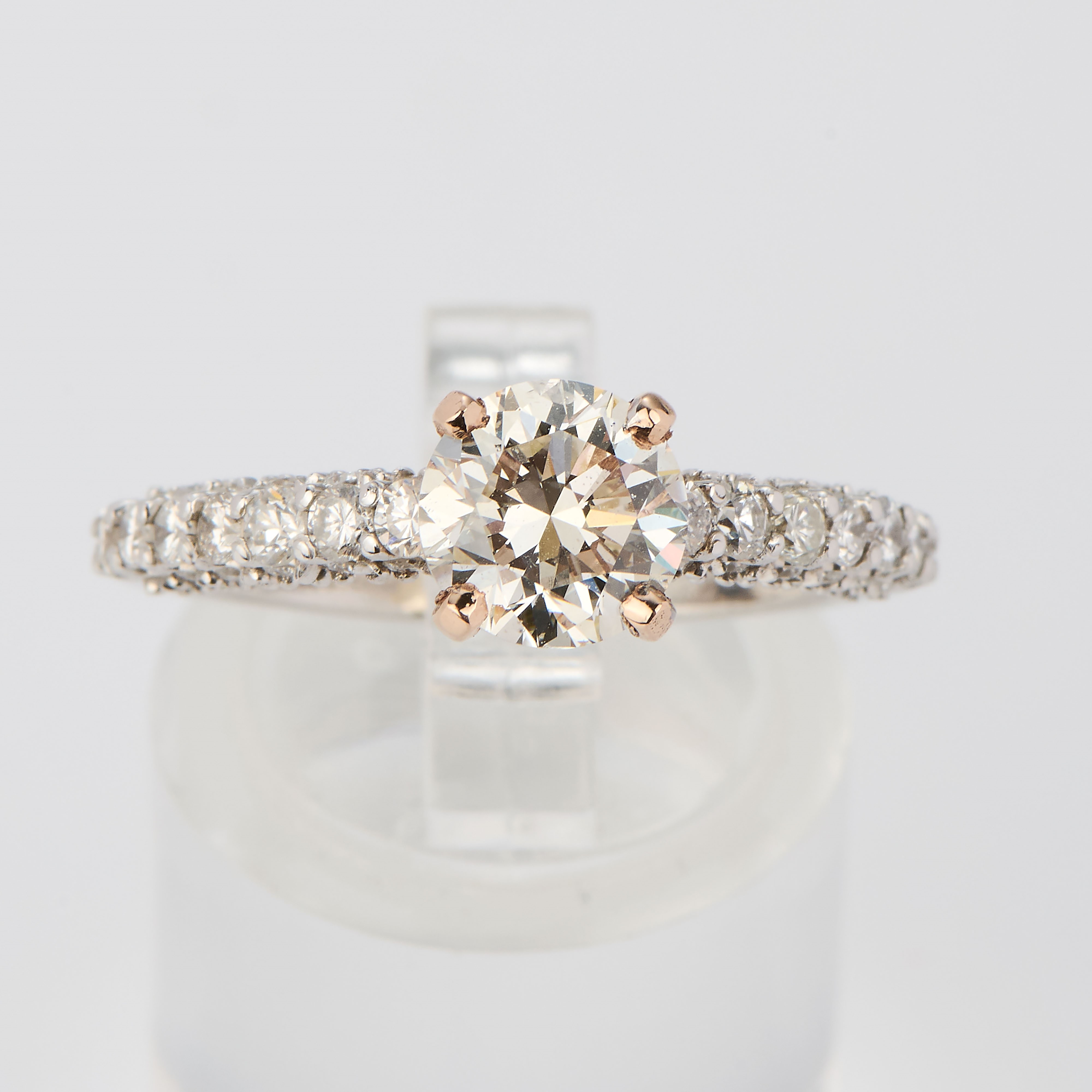 Anello solitario in oro bianco e rosa con diamanti