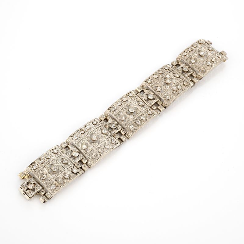 Bracciale a fascia snodata in platino e diamanti