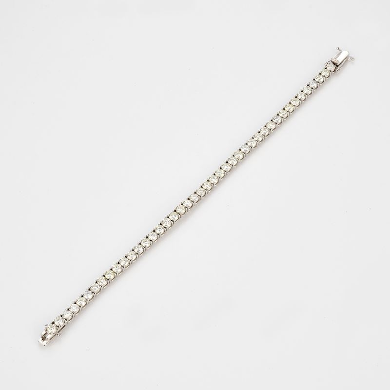 Bracciale tennis in oro bianco e diamanti