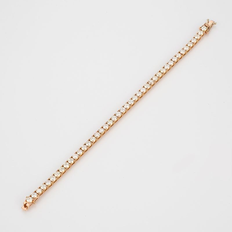 Bracciale tennis in oro giallo e diamanti