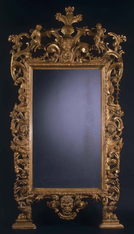 Specchiera Rococò in legno riccamente intagliato e dorato