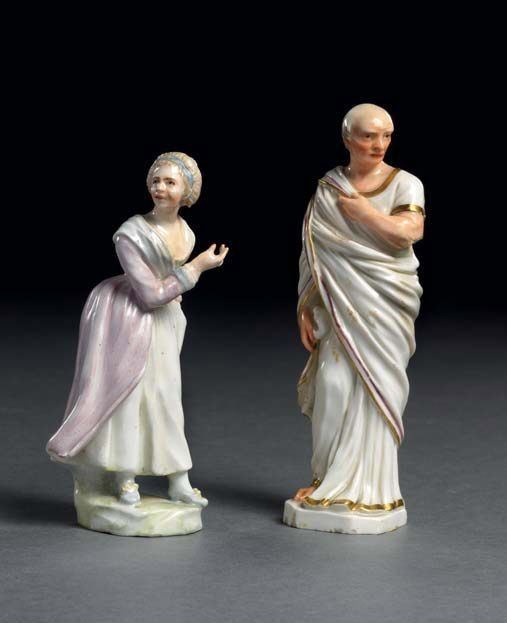 Lotto Composto da Due Statuette in Porcellana Policroma e Oro
