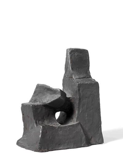 Kleine Sitzende Figure