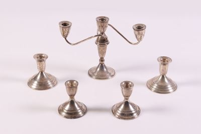 Due Coppie di Bugie e un Candelabro a Tre Fiamme in Argento
