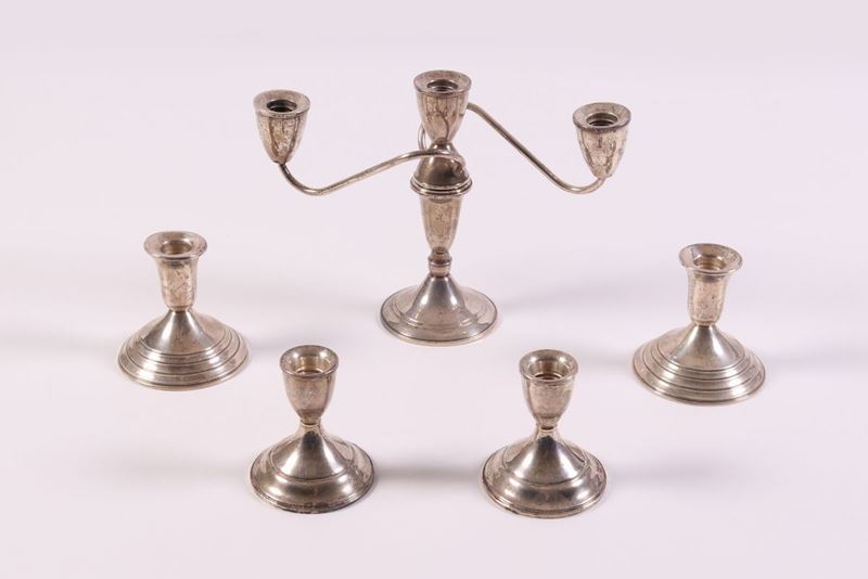 Due Coppie di Bugie e un Candelabro a Tre Fiamme in Argento