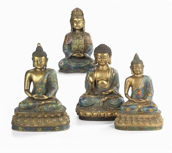 Quattro statuette in bronzo smaltato