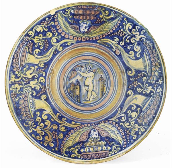 Grande piatto in maiolica policroma a lustro blu, oro e rosso